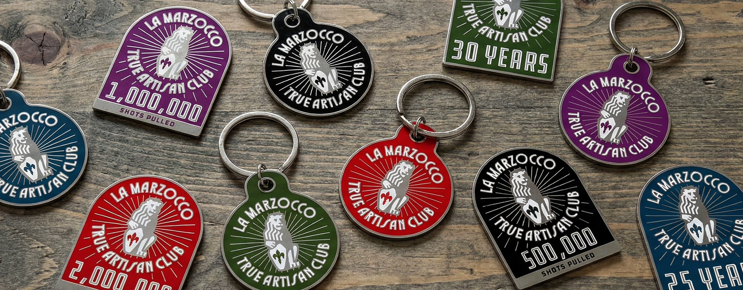 True artisan club magnets and keychains