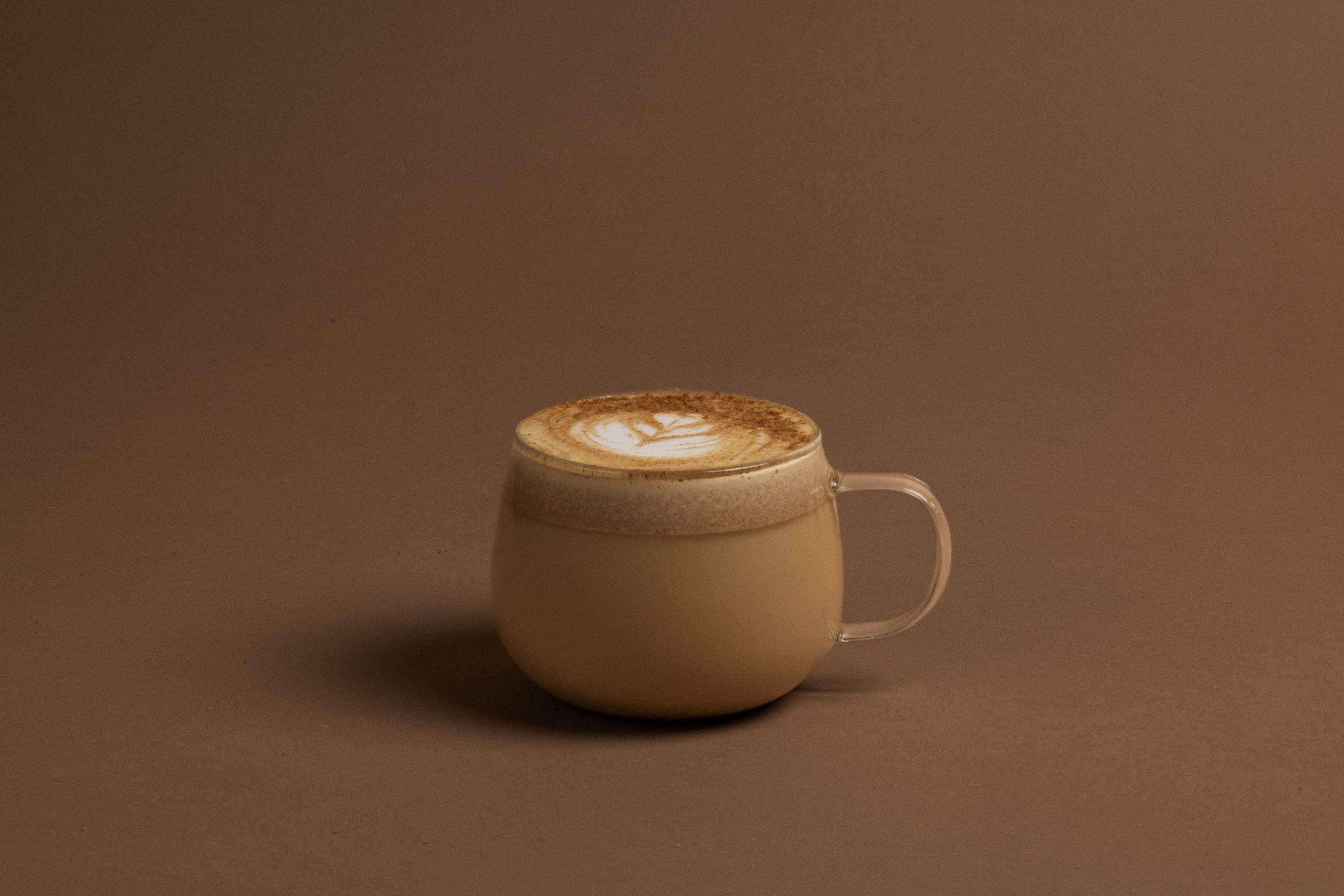 photo of Verve's Pumpkin Spice Latte in a mug on a brown background