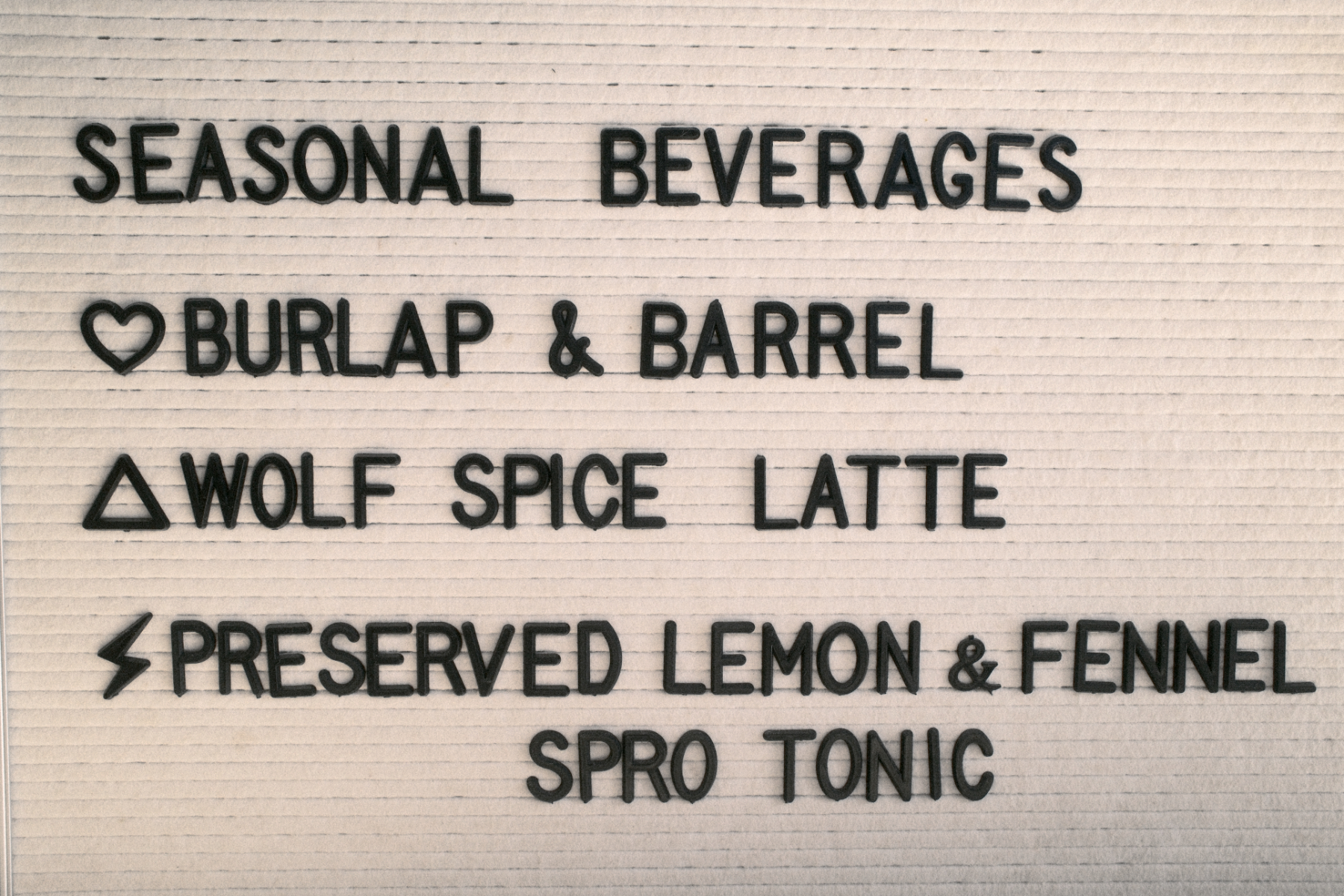 a seasonal beverage menu listing burlap & barrel wolf spice latte
preserved lemon & fennel sprouts tonic